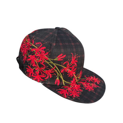 "SPIDERLILY" embroidered satin-lined cap