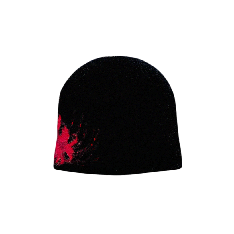 Black beanie with red pattern on a white background